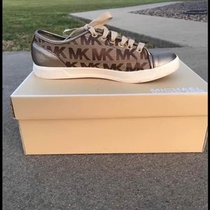 Michael kors gold shoes.